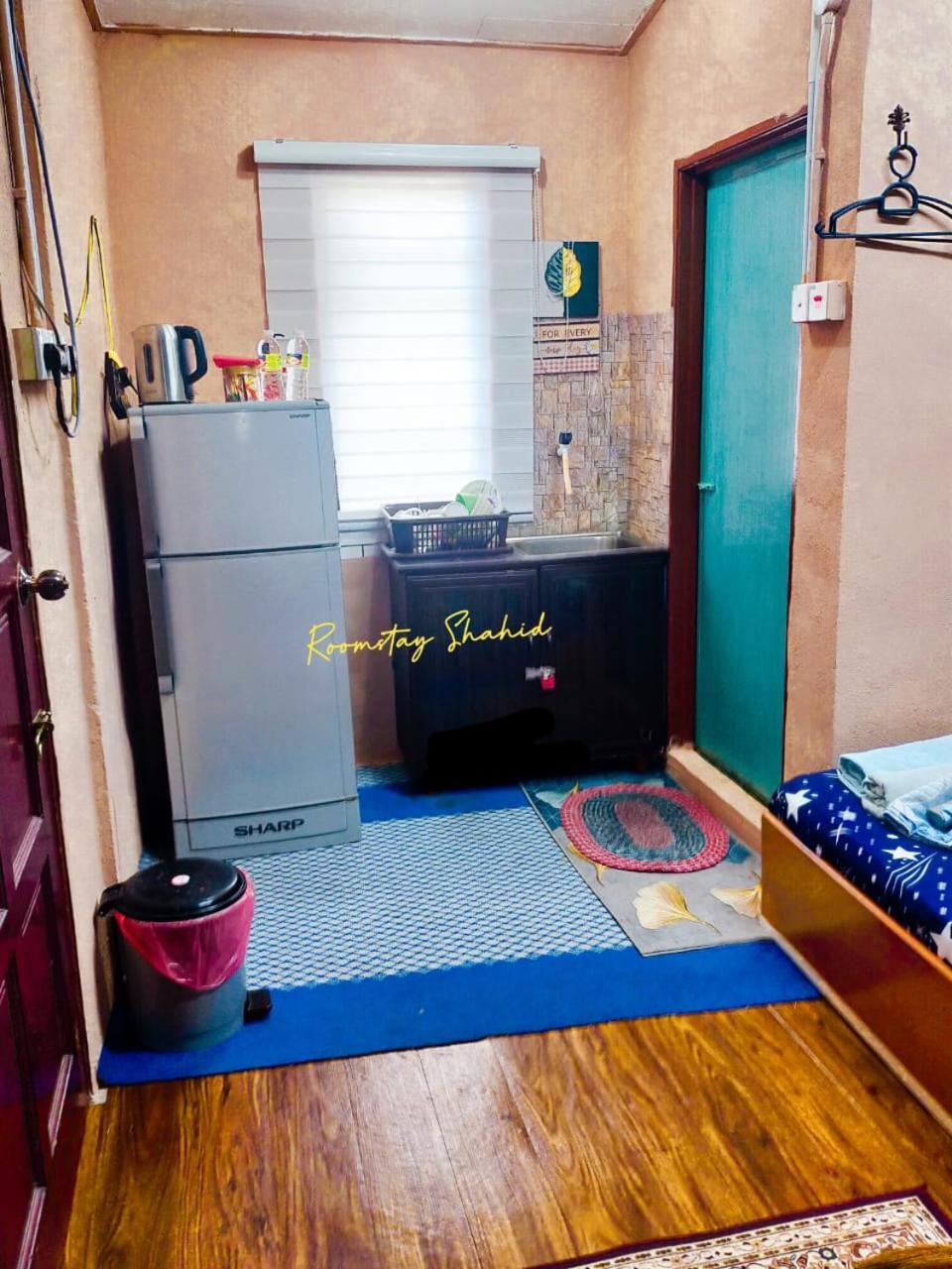 Roomstay Shahid Hou'Ze Kangar Bagian luar foto